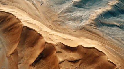 Abstract aerial view of intricate desert sand dune patterns and textures.
