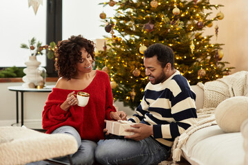 Joyful couple shares warmth and love during Christmas celebration