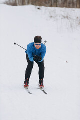 Male skier performing winter sport activity outdoors