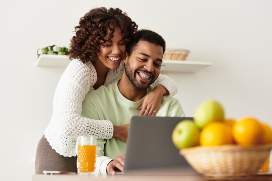 Happy couple enjoying quality time together in their modern apartment