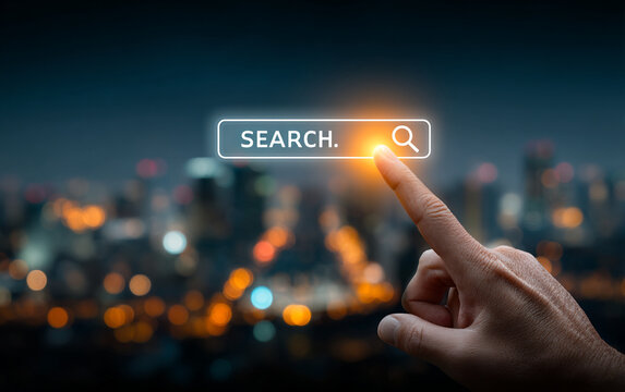 Hand Pressing Search Bar Icon on Virtual Screen Over Night Cityscape Background