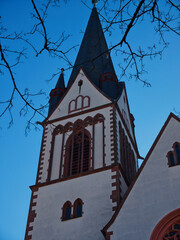 Gothic Church Tower Against Blue Sky