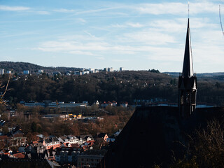 Scenic Town View with Church Steeple and Hills