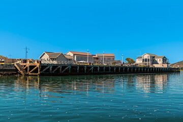 A view from the Knysna River towards the dock on Thesen Island at Knysna, South Africa in Springtime