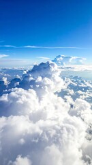 Stunning aerial view from above a sea of fluffy white clouds.