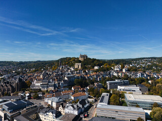 Aerial View of European City with Castle on Hill