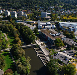 Aerial View of University Campus with River and Greenery