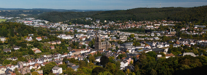Aerial View of Town with Prominent Church and Lush Greenery