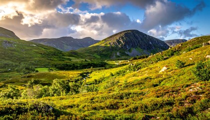 Dramatic landscape with rolling hills, vibrant green vegetation, and a mountain range under a cloudy sky at sunset