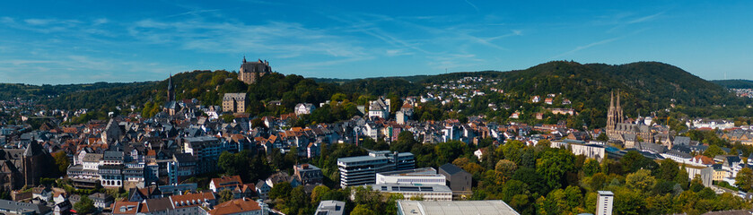 Aerial View of European City with Castle on Hill