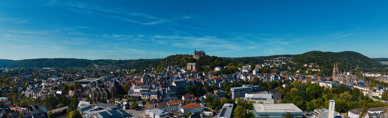 Aerial View of European City with Castle on Hill