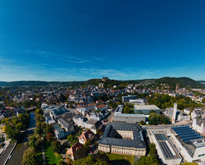 Aerial View of European City with Castle on Hill