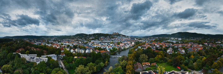 Aerial View of European Town with Castle and River