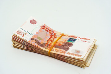 Stack of Russian rubles on a plain background
