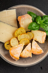 Cheese plate different kind of cheese appetizer tasty snack fresh delicious gourmet food background on the table rustic top view copy space