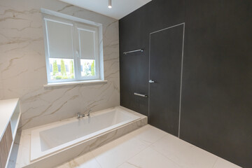 Modern minimalist bathroom interior, modern bathroom cabinet, white sink, wooden vanity.