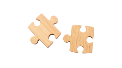 Two wooden puzzle pieces, light colored, interlocking design, symbolizing connection and problem solving