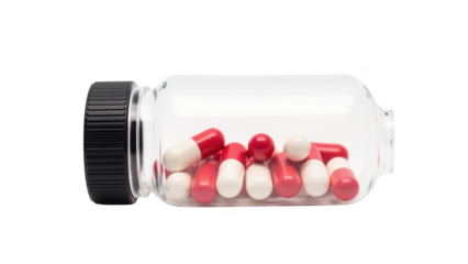 Pill bottle containing red and white capsules, showcasing variety of medication. transparent container highlights colorful pills inside