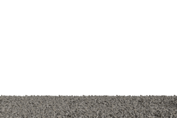 A dark void with a rough, textured surface of small stones and gravel at the bottom