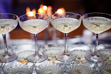 Elegant champagne glasses filled with sparkling wine