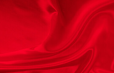 Black red satin dark fabric texture luxurious shiny that is abstract silk cloth background with patterns soft waves blur beautiful.