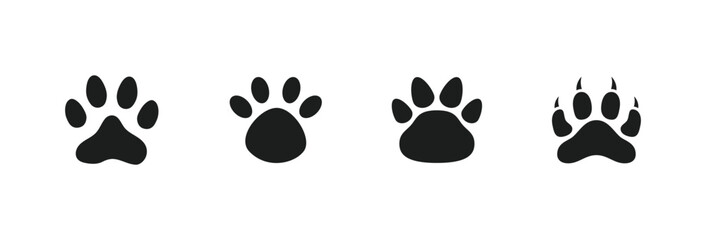 Paw print of a dog or cat. Set of different Animal footprint. Footprint pet. Paw print of dog, cat, tiger paws, Bobcat, kitten leg, puppy pet footprint. Puppy track. Feline step silhouette. © Daily Beaters Studio
