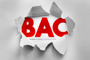 BAC abbreviation exposed through ripped paper, symbolizing Blood Alcohol Concentration. Conceptual visual related to intoxication levels, law enforcement, or health and safety awareness