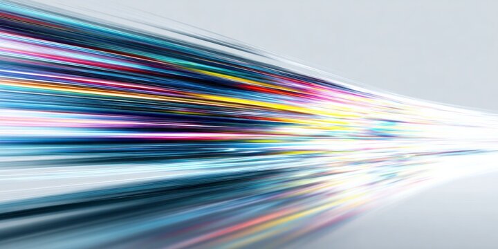 Brilliant streaks of multicolored light converge toward a bright vanishing point. - Powered by Adobe