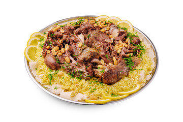 Delicious rice dish with tender lamb, nuts, and lemon slices served on a platter