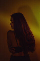 Moody Neon Portrait of Woman with Creative Lighting and Motion Blur