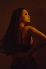 Moody Neon Portrait of Woman with Creative Lighting and Motion Blur