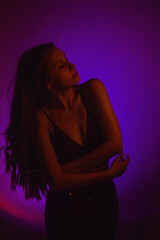 Moody Neon Portrait of Woman with Creative Lighting and Motion Blur