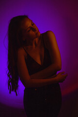 Moody Neon Portrait of Woman with Creative Lighting and Motion Blur