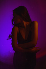 Moody Neon Portrait of Woman with Creative Lighting and Motion Blur