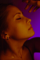 Moody Neon Portrait of Woman with Creative Lighting and Motion Blur