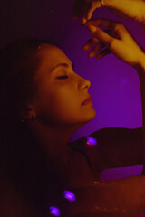 Moody Neon Portrait of Woman with Creative Lighting and Motion Blur