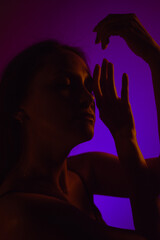 Moody Neon Portrait of Woman with Creative Lighting and Motion Blur