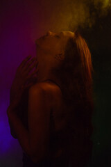 Moody Neon Portrait of Woman with Creative Lighting and Motion Blur
