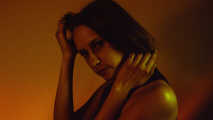 Moody Neon Portrait of Woman with Creative Lighting and Motion Blur