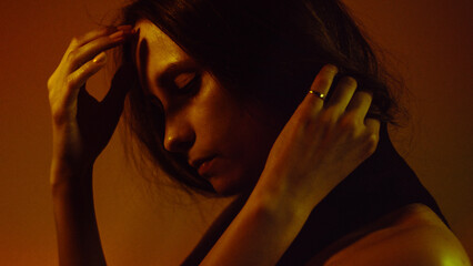 Moody Neon Portrait of Woman with Creative Lighting and Motion Blur