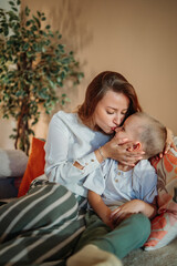 Young caucasian woman and her son spending quality time together