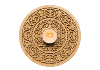 Ornate carved wooden circular mandala with a glowing candle in the center isolated on transparent background