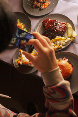 Food photographed with a smartphone, everyday dining documentation and reflecting modern habits of sharing meals through digital culture and social media. User generated content