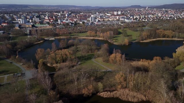 Aerial Cityscape with Parks and Lakes in Autumn