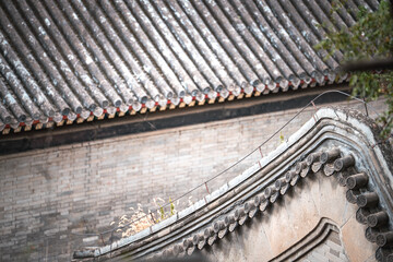 Close up details of an ancient building in Beijing, China, at the Summer Palace. The photo captures architectural details.