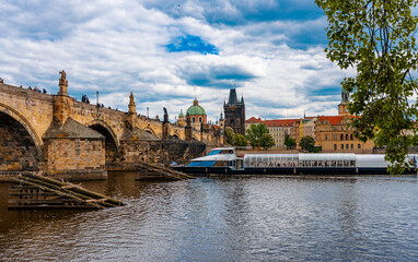 Tourist Ship on Vltava Near Prague Charles Bridge.
