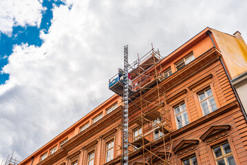 Historic Building Renovation Scaffoldings and Construction Hoist.