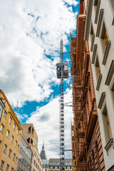 Historic Building Renovation Scaffoldings and Construction Hoist.