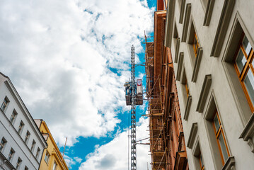 Historic Building Renovation Scaffoldings and Construction Hoist.
