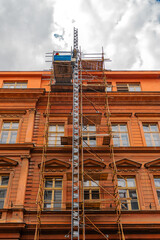 Historic Building Renovation Scaffoldings and Construction Hoist.
